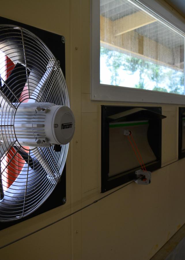 Fan and air inlet in side wall